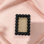 cadre photo moderne rondes orange noir bleu clair rose doré blanc clips noirs fond