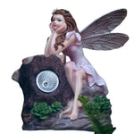statuette féerique verte rouge blanc papillon champignon roche solaire nuit extérieur decoration cour