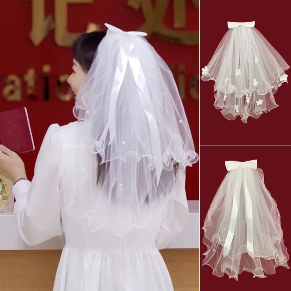 voile mariée blanc translucide détails floraux classique clips inclusion élégant