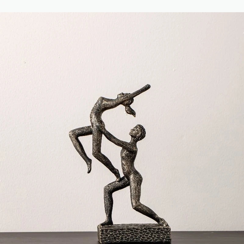 sculpture moderne danseurs figures humaines interaction dynamique penseur livres étagère decoration abstraite chaleur coloris