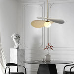 suspension lumineuse moderne or noir blanc ailes métalliques incurvées minimaliste chambre salon