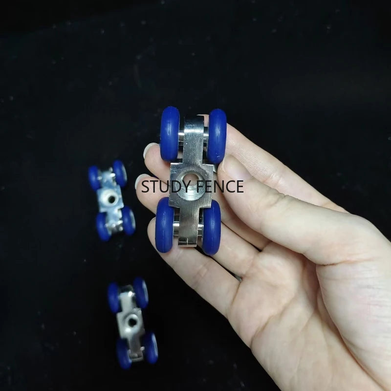 roulettes porte coulissante argentées bleues vis quincaillerie industrielle métal suspension poulies rails fixations utilitaires