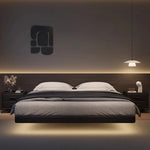 lit double moderne minimaliste tables chevet bois marron gris couverture noire