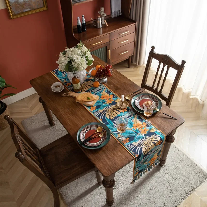 nappe bohème motifs floraux franges couleur bleu foncé orange verte marron rustique