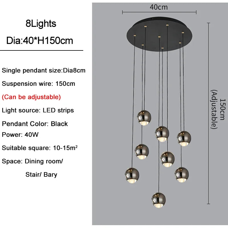 suspension lumineuse contemporaine noir doré sphères métalliques brillantes éclairage intérieur maison