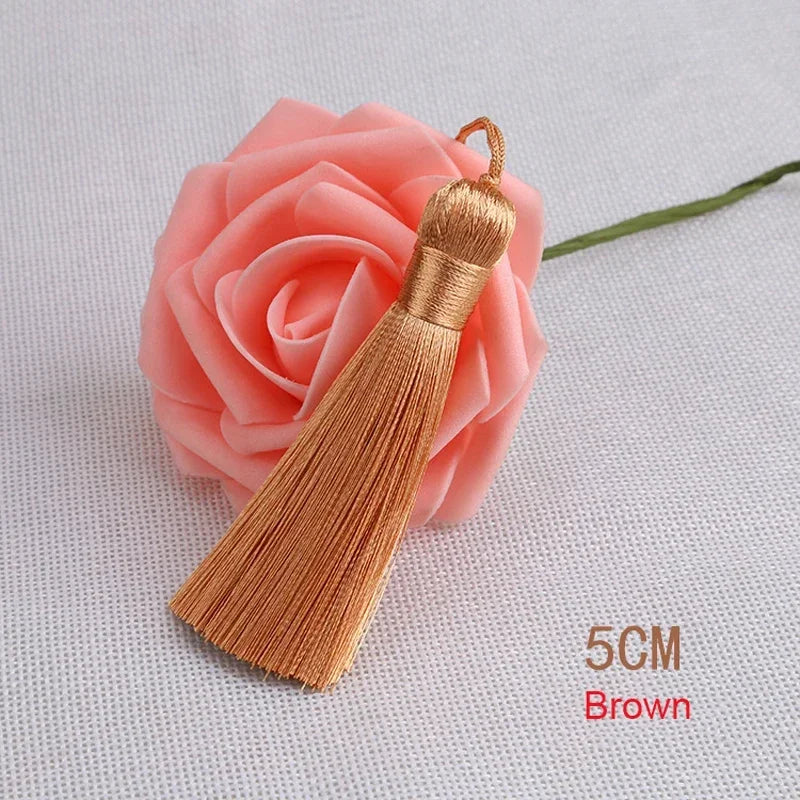 pompons polyester couleur variée 5cm longueur 18cm décoration artisanale rideaux couture pièces