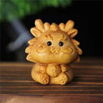 statuettes animales sculptées détaillées zodiaque naturel brun clair artisanal figurines individuelles opaques