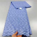 tissu dentelle coton blanc motifs floraux broderie strass robe couture luxe