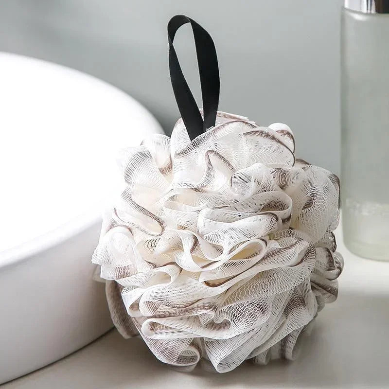 boule bain éponge nettoyage douce maille fine fluffy moderne rose clair vert anneaux noirs