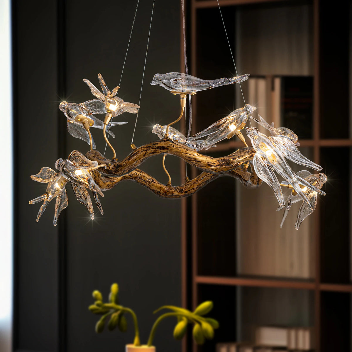 lampe suspendue transparente branches dorées oiseaux verre moderne naturel chambre hall étude