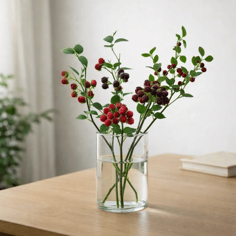 décoration intérieure bouquets branches baies rouges feuilles vertes artificielles naturelles occasion fête maison