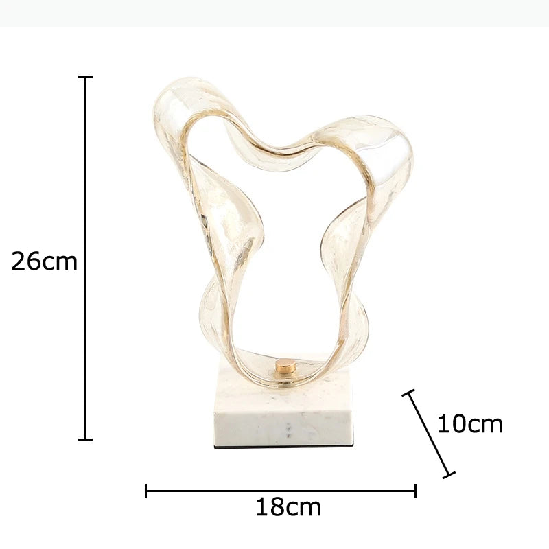 sculpture contemporaine transparente dorée onctueuse base marbre blanche décoration intérieure moderne art abstrait geometrique