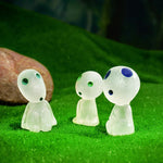 décoration intérieure moderne figurines transparentes bleues vertes yeux sourires adhésives différentes tailles opalescentes minimalistes