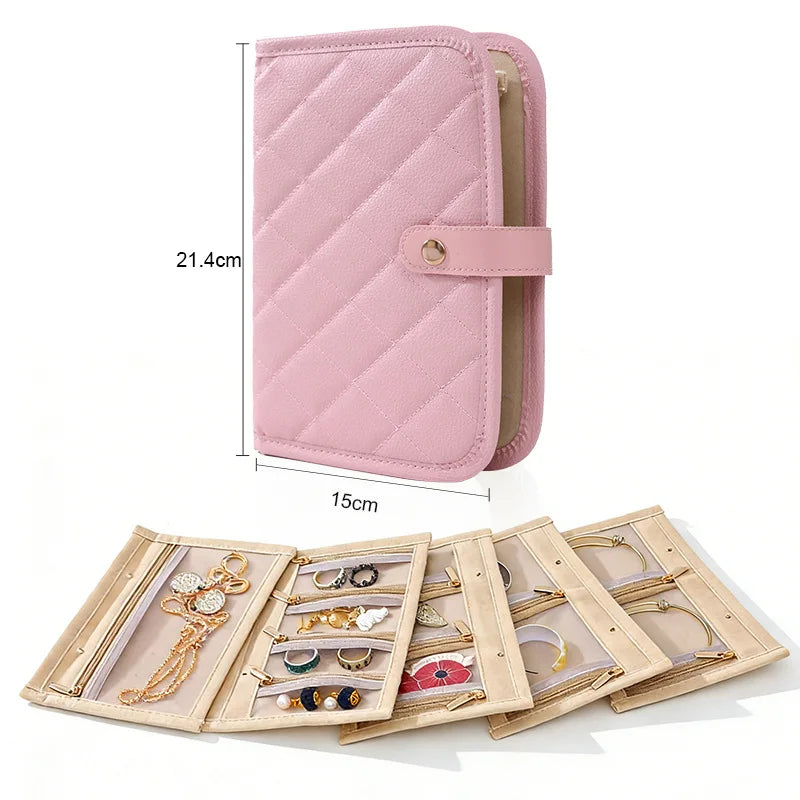 porte bijoux pliable cuir motifs géométriques noir blanc rose pâle moderne pratique boucle fermeture