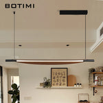 lampe suspendue moderne noire bois naturel texture bois chambre salon étude