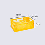 paniers pliables plastique bleu clair jaune rose vert pastel perforations modernes pratiques poignées