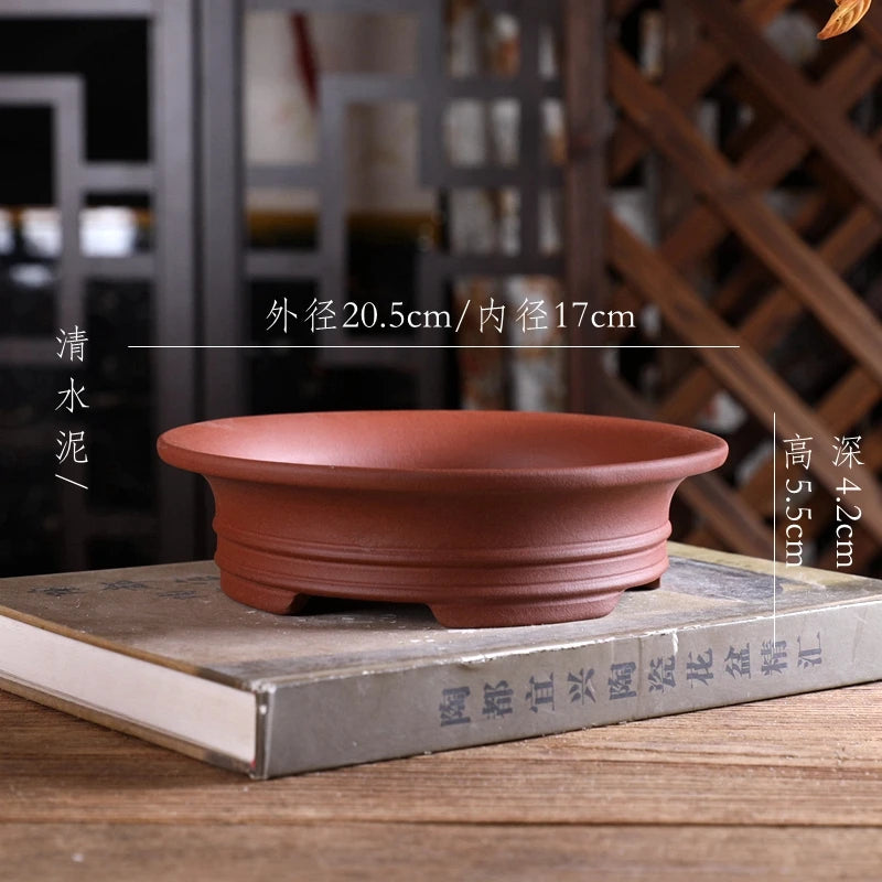 cache pot rond classique minimaliste couleur beige clair poterie lisse décoration table jardin fleurs