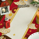 L'image présente un fond rouge festif avec des motifs dorés décoratifs, une bougie allumée dans un cadre lumineux et un contenant en forme de sel, créant une ambiance chaleureuse et festive pour Noël.