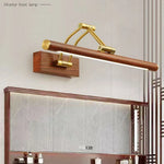 lampe miroir or bois minimaliste éclairage quotidien contemporain fixée mur texture bois naturelle finition