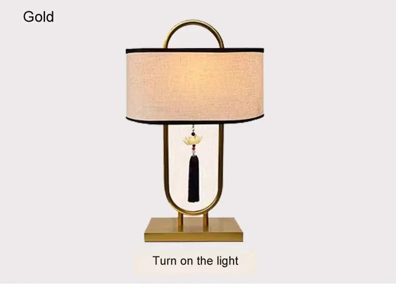 lampe table tissu texturé moderne asiatique pompon abatjour opaque métal noir