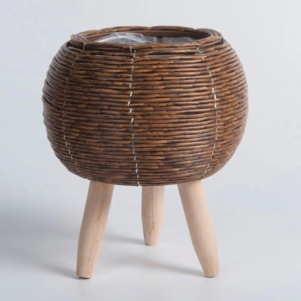 cache pot tressé rotin moderne cactus feuilles vertes marron clair pieds bois durable tissé