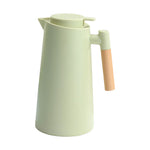 carafe thermique blanc vert pastel rose pâle noir poignée bois ouverture fente bouchon évacuation