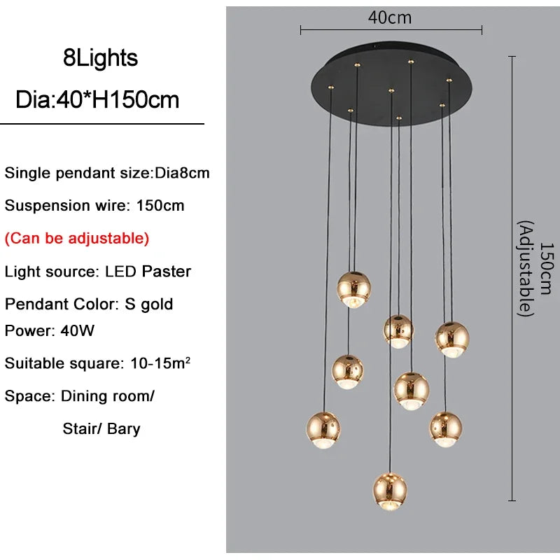 suspension lumineuse contemporaine noir doré sphères métalliques brillantes éclairage intérieur maison