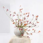 décoration intérieure branche artificielle feuilles automne baies rouges vert ornement hiver naturel rustic maison