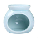 diffuseur parfum bougie chauffe parfum moderne minimaliste bleu clair rose jaune vert blanc rouge
