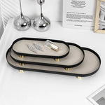 plateau ovale moderne plateau rangement métal couleur beige doré matériau mat opacité vis dorées