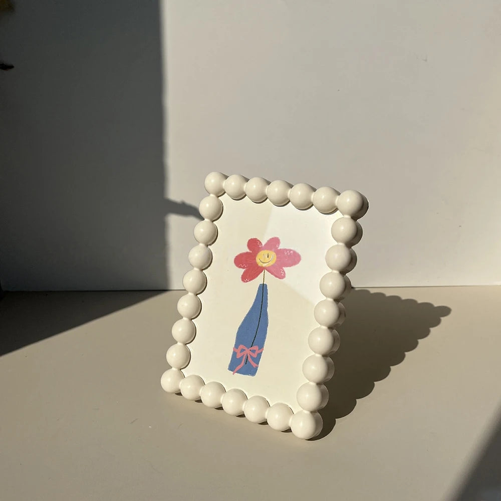 cadres photo decoratifs vert bleu rose blanc deco enfantine minimaliste artistique illustrations fleurs théière