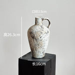 vase poterie moderne gris beige fleur séchée décoration intérieure texture marbrée lisse rustique arrangement