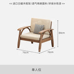 canapé places scandinave beige clair fauteuil pied poule moderne tapis géométrique terracotta blanc