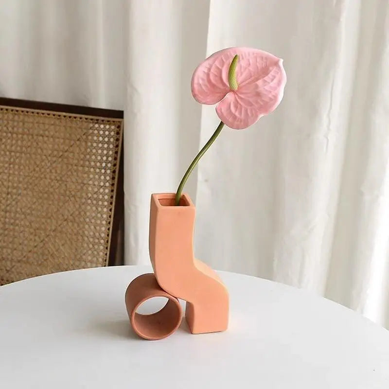 décoration intérieure fleurs artificielles rose verte blanches modernes minimalistes chambre fête