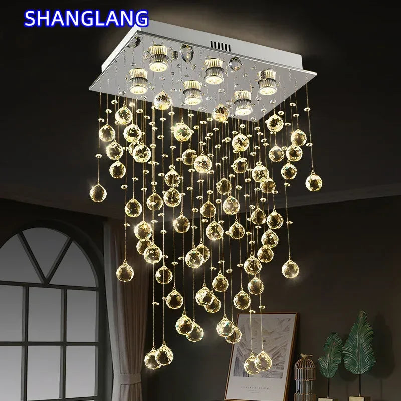 suspension lumineuse moderne transparente cristal brillantes élégante dorée fixations invisibles chaînes incluses