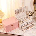 boîte rangement bijoux cuir motifs géométriques compartiments velours classique vert noir blanc rose chic