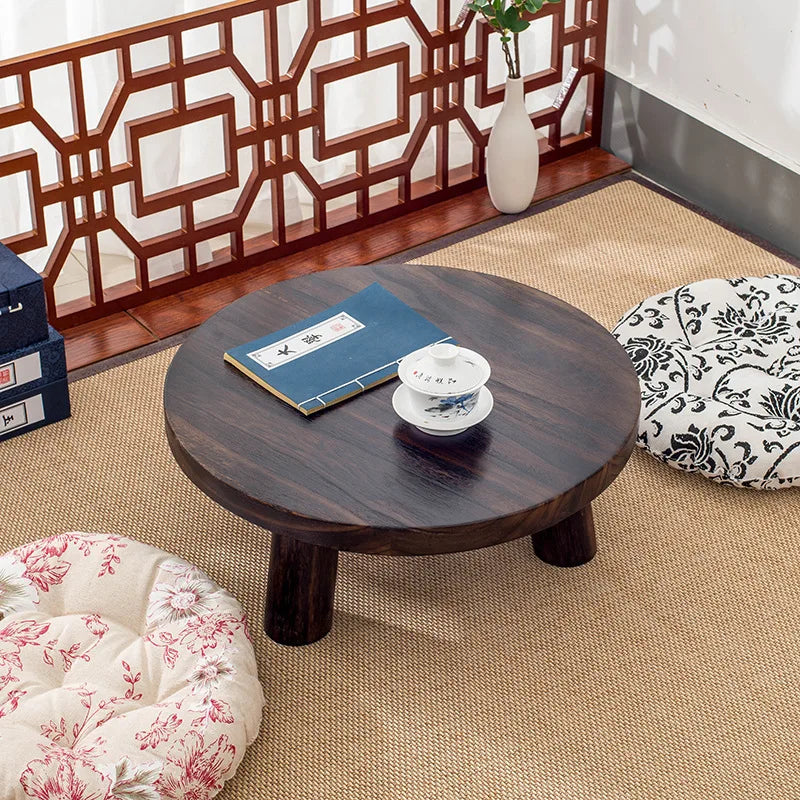 table basse bois massif moderne minimaliste ronde naturelle brun foncé salon maison japonaise