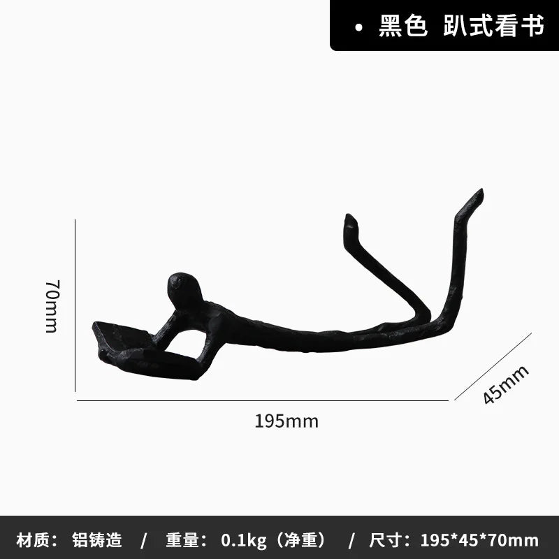 statuette moderne minimaliste or noir texture rugueuse stylisée acrobatie décoration pièce ornement figure