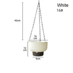pots plante suspendus auto arrosants rayures verticales chaînes métalliques blanc vert gris moderne