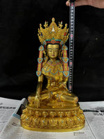 statue bouddhiste or turquoise rouge blanche motif complexe texture lisse traditionnel lotus assis grande