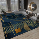 Un tapis de salon aux motifs géométriques abstraits dans des tons bleus et dorés, créant une atmosphère moderne et élégante dans ce salon décoré de façon tendance.
