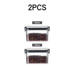 boîtes rangement alimentaire transparentes poignées noires multiple tailles réutilisables modernes pratiques épices pâtes graines