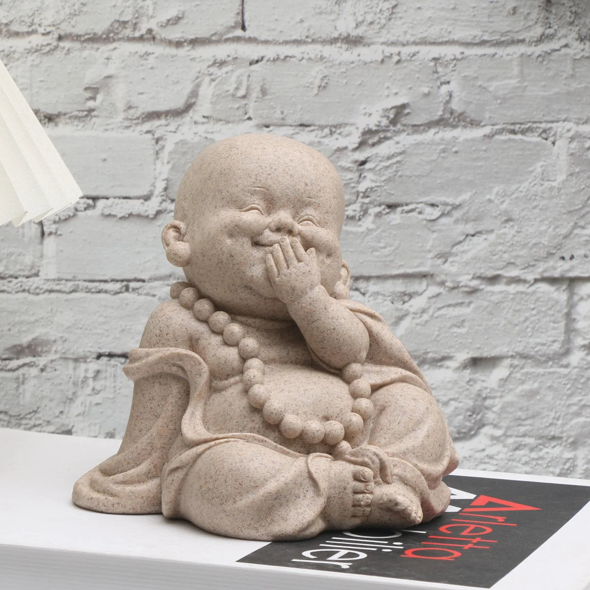 statuettes bouddha enfant résine beige clair marron motifs dorés zen