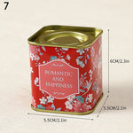 boîtes métal bleu rose noir fleurs vintage capsules étiquettes messages conservation snacks thé