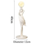 sculpture décorative moderne figure féminine globe lune noir blanc bleu clair résine chambre salon