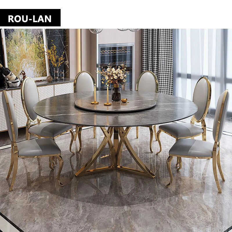 table ronde moderne marbre imitation blanc chaises gris clair pieds dorés textures luxueuses salles