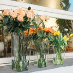 vases modernes transparents rectangulaires lisses intérieur décoration arrangement floral table