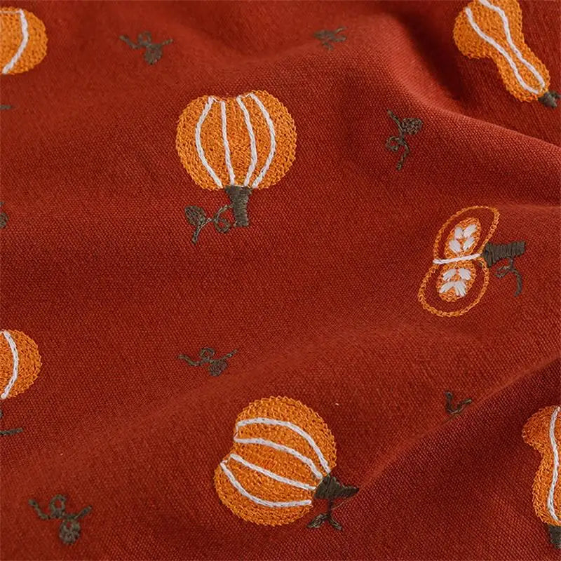 tissu brodé citrouilles champignons rouge brun textile décoratif respectueux environnement largeur 125cm matériaux bricolage