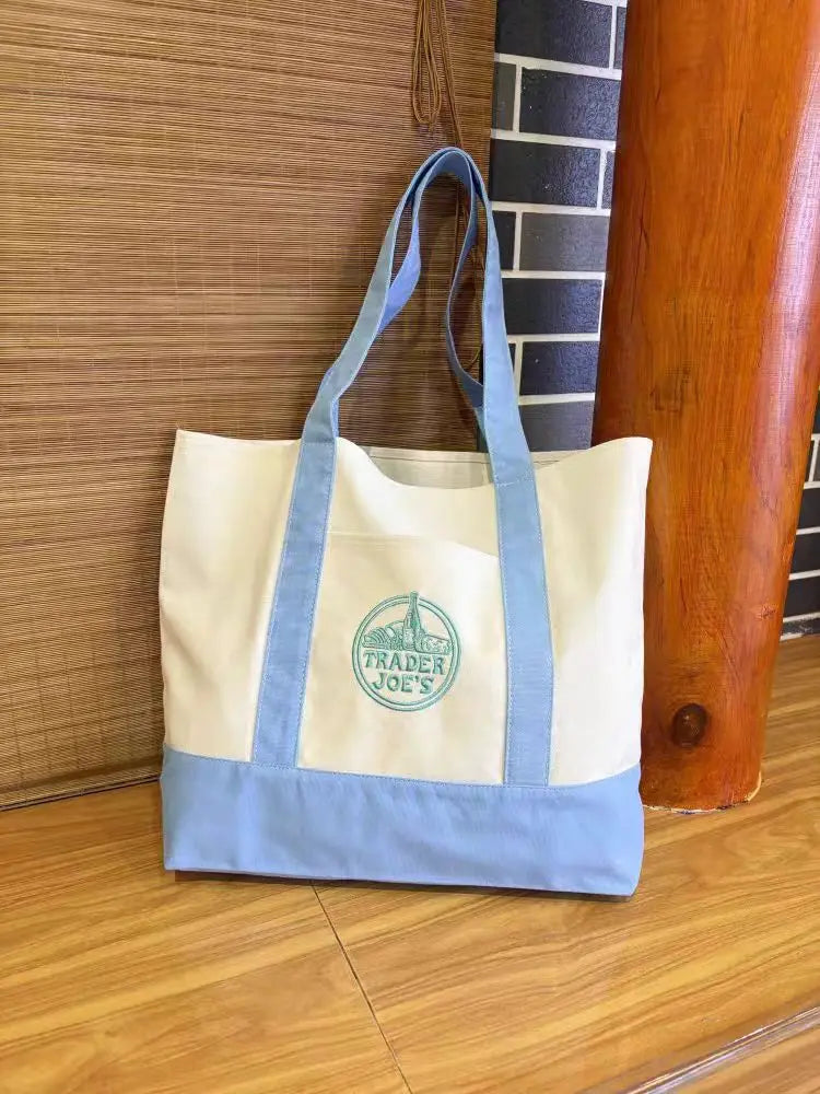 sacs toile colorés blanc vert violet rouge jaune logo trader joes poignées tissu casual