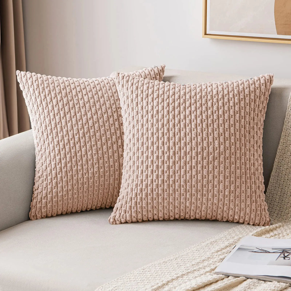 coussins carrés vert clair beige rose pâle texture tissée pompons moderne fermeture glissière